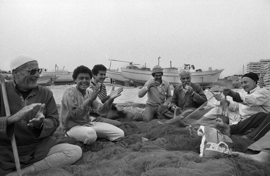 Fishermen in the morning on the beach, Gaza, Palestine, 1987, by Joss Dray